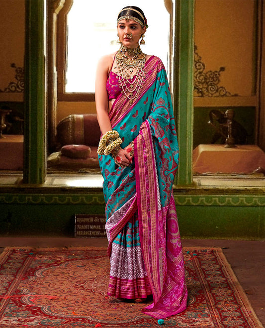 Blue ikkat floral buttas woven designer catalog saree, contrast ikkat rudraksha border, and pallu of ikkat weave