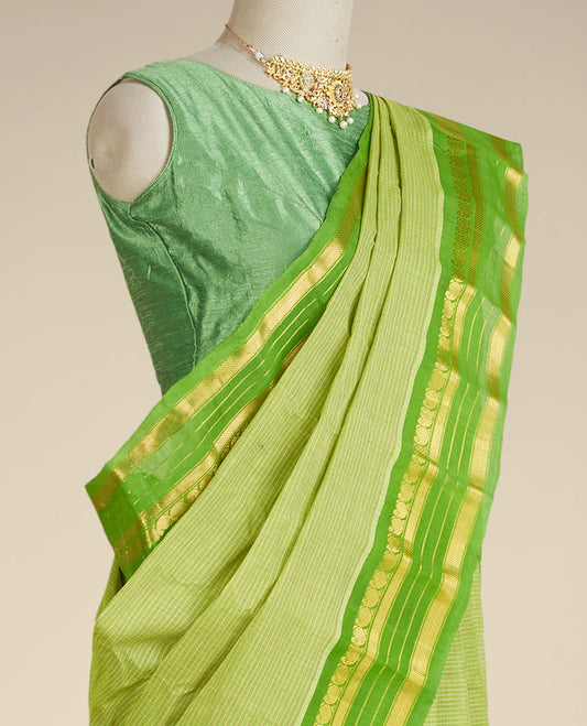 Light green micro-checked gadwal saree, contrast traditional design zari border & pallu of zari stripes