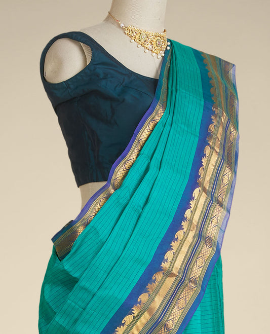 Green striped gadwal silksaree, contrast border of traditional zari designs & zari-enriched pallu