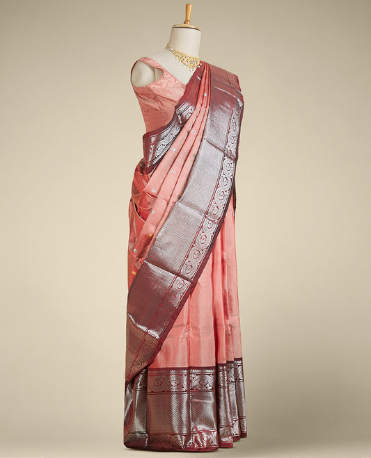 Pink gadwal silksaree with zari buttas,contrast zari rich pallu of intricate designs & border of peacock & floral vine