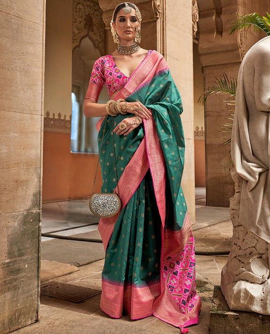 Green-red chakram zari buttas designer catalog saree, contrast temple traditional zari border, and pallu of double ikkat patola weave