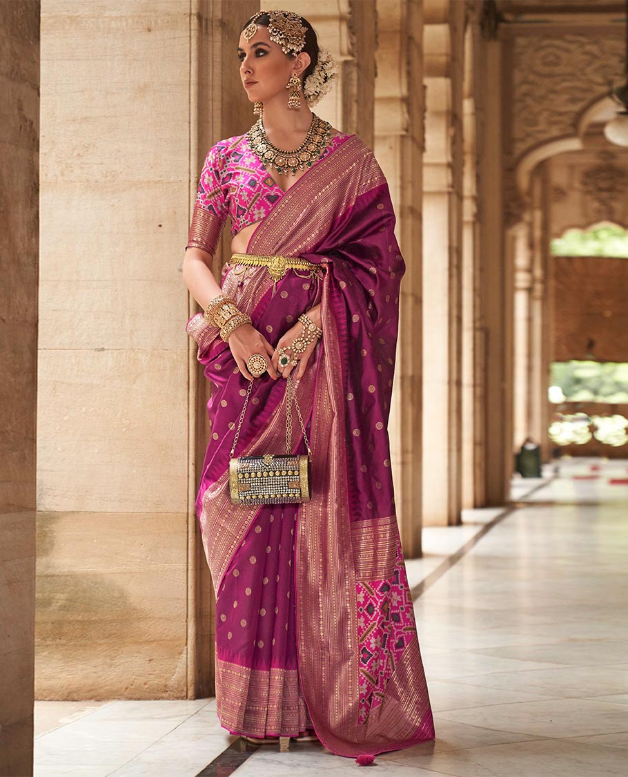 Purple chakram zari buttas designer catalog saree, contrast temple traditional zari border, and pallu of double ikkat patola weave