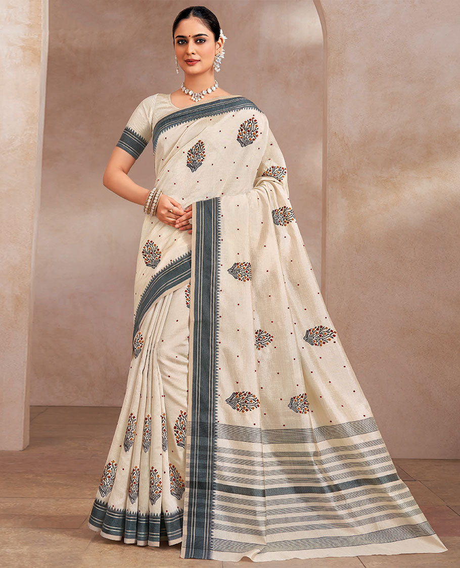 Cream floral vase buttas embroidered designer saree, contrast temple border, and striped pallu