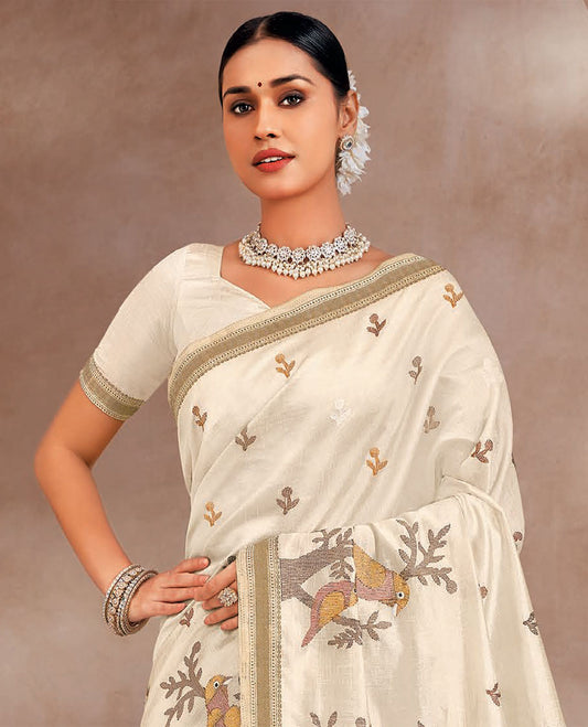 Cream floral buttas and birds on the branches motifs embroidered designer saree, self-border, and pallu