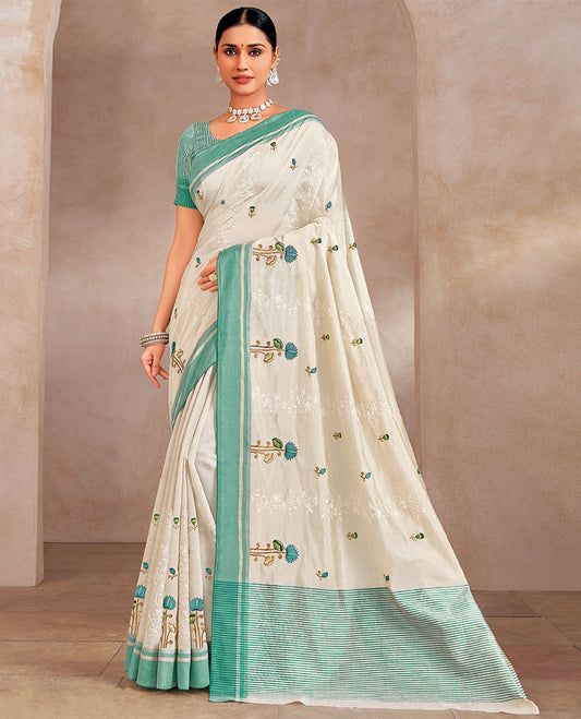 Cream and turquoise floral motifs designer saree, contrast plain border, and striped pallu