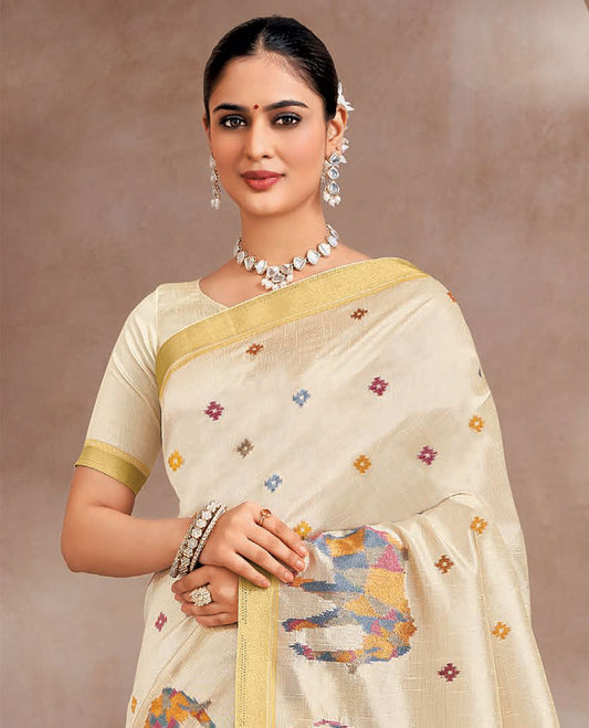 Cream colorful buttas and elephant motifs designer saree, zari border, and striped pallu
