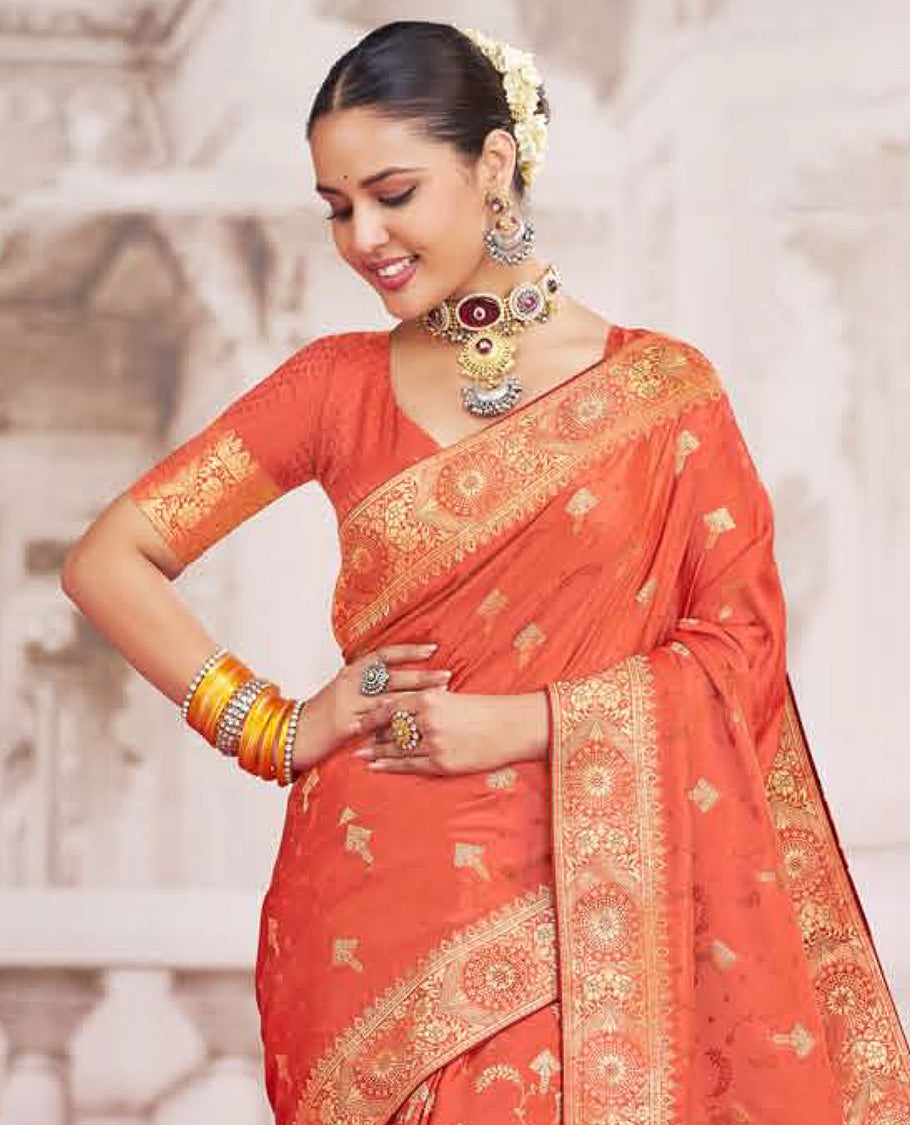 Orange buttas designer catalog saree, chakram design border, and pallu of ogee designs