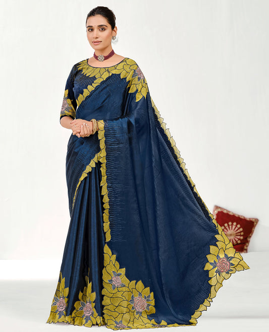 Blue Embroidered Designer Saree Features Realistic Floral Motifs, Embroidered Borders, a Floral Embroidered Pallu, and an Embroidered Blouse