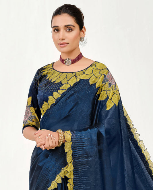 Blue Embroidered Designer Saree Features Realistic Floral Motifs, Embroidered Borders, a Floral Embroidered Pallu, and an Embroidered Blouse