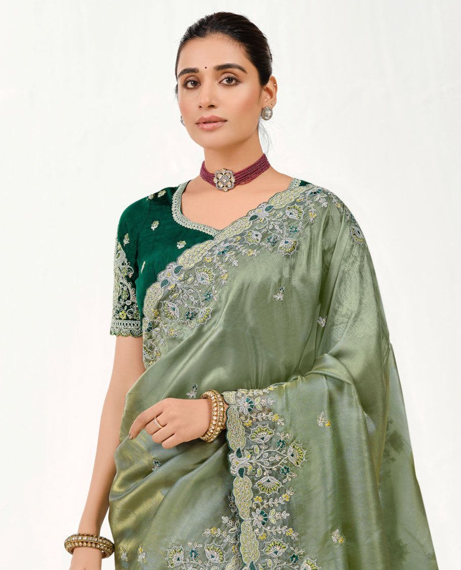 Green Floral Embroidered Designer Saree with Peacock and Floral Motifs Embroidered Scallop Border, Embroidered Pallu, and a Contrast Embroidered Blouse