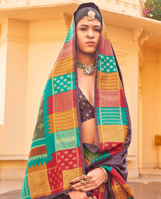 Brown Designer Saree, Detailed with Buttas, Complemented by a Contrast Temple Multi-Color Butta Woven Border, Intricate Pallu, and a Matching Blouse