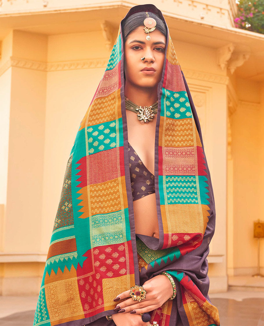 Brown Designer Saree, Detailed with Buttas, Complemented by a Contrast Temple Multi-Color Butta Woven Border, Intricate Pallu, and a Matching Blouse