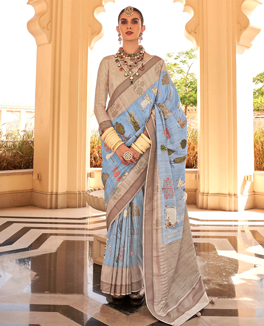Blue Pichwai cow, tree, floral, and lotus printed designer catalog saree, contrast border of floral motifs, and pallu of temple design