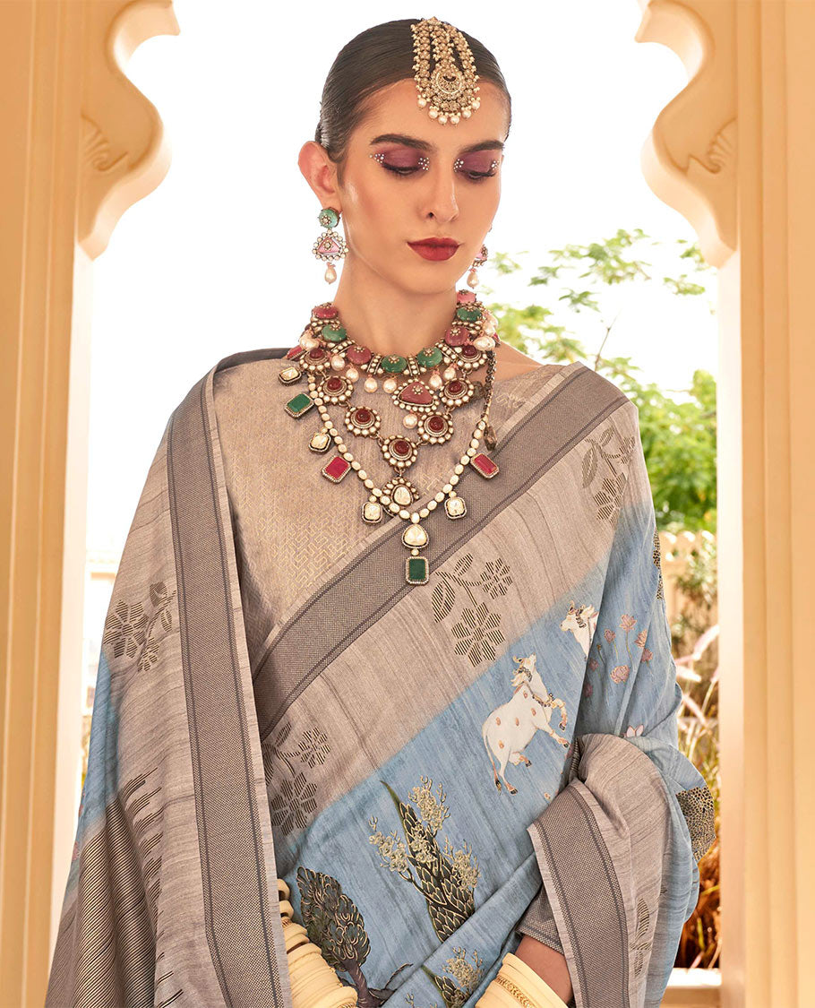 Blue Pichwai cow, tree, floral, and lotus printed designer catalog saree, contrast border of floral motifs, and pallu of temple design