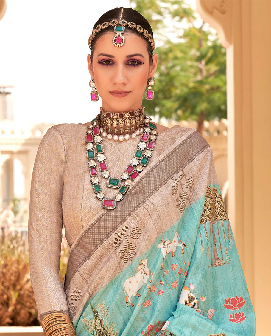 Turquoise pichwai cow, tree, floral, and lotus printed designer catalog saree, contrast border of floral motifs, and pallu of temple design