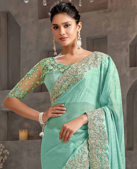 Light green catalouge  designer saree with self floral embroidery border