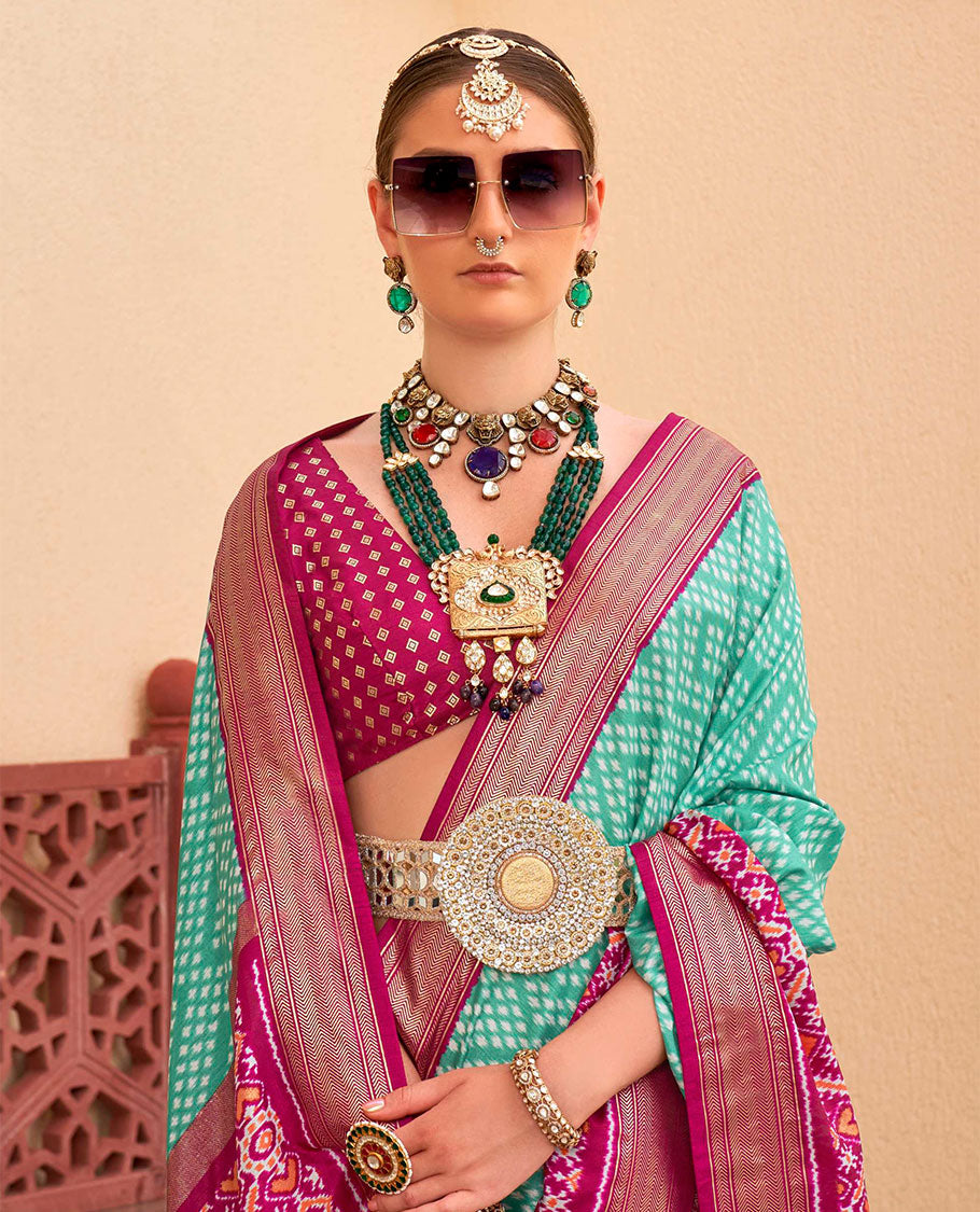 Turquoise-pink jaal patola designer catalog saree, contrast border and pallu of intricate patola weave
