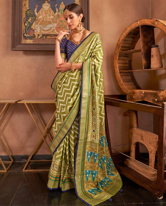 Parrot green ikkat chevron striped designer catalog saree, zari border and ikkat geometric patterned pallu