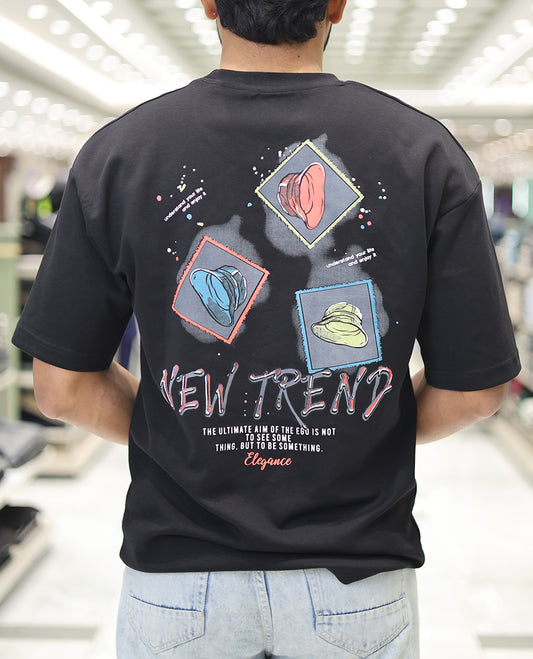 Black Glow in the Dark Cotton-Blended T-Shirt, Decked Up with Colorful Cartoon Motifs Print, Comes with a Crew Neck, Half-Sleeves, Oversized Fit, and Long Length