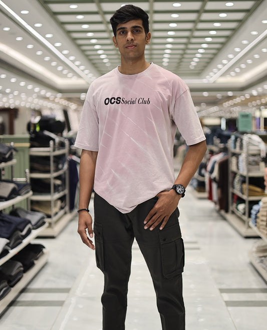 Pink Cotton-Blended T-Shirt, Accentuated with Typography Print, Comes with a Crew Neck, Half-Sleeves, Oversized Fit, and Long Length