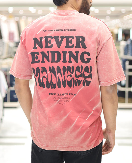 Red Cotton-Blended T-Shirt, Detailed with Typography Print, Comes with a Crew Neck, Half-Sleeves, Oversized Fit, and Long Length