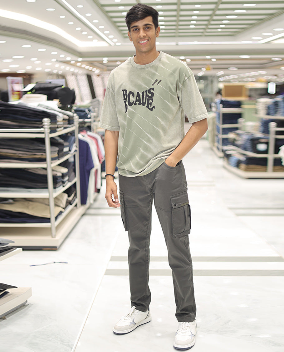 Olive Green Cotton-Blended T-Shirt, Detailed with Typography Print, Comes with a Crew Neck, Half-Sleeves, Oversized Fit, and Long Length