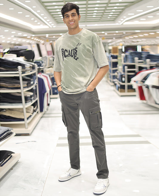 Olive Green Cotton-Blended T-Shirt, Detailed with Typography Print, Comes with a Crew Neck, Half-Sleeves, Oversized Fit, and Long Length