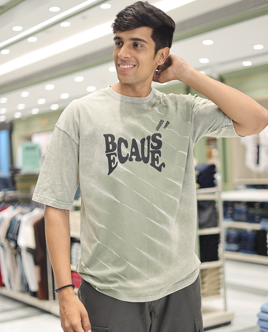 Olive Green Cotton-Blended T-Shirt, Detailed with Typography Print, Comes with a Crew Neck, Half-Sleeves, Oversized Fit, and Long Length