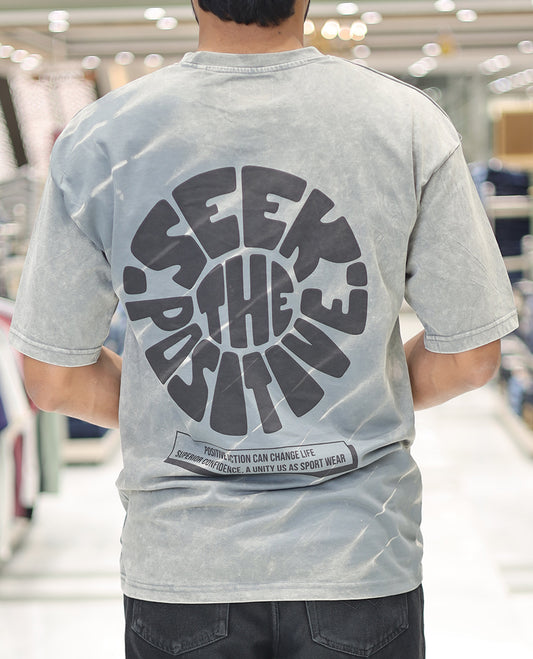 Grey Cotton-Blended T-Shirt, Elevated with Typography Print, Comes with a Crew Neck, Half-Sleeves, Oversized Fit, and Long Length