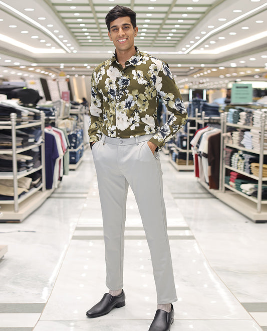 Green Cotton Blended Casual Shirt, Accentuated with Tropical Floral Prints, a Spread Collar, Full Sleeves, Slim Fit, and Regular Length