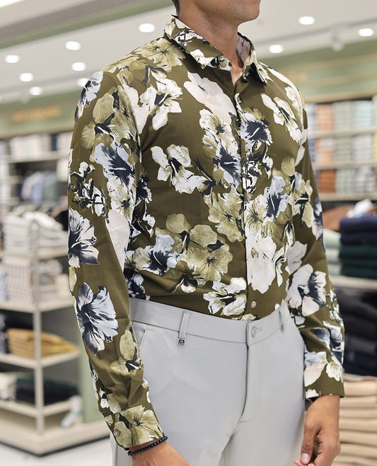 Green Cotton Blended Casual Shirt, Accentuated with Tropical Floral Prints, a Spread Collar, Full Sleeves, Slim Fit, and Regular Length