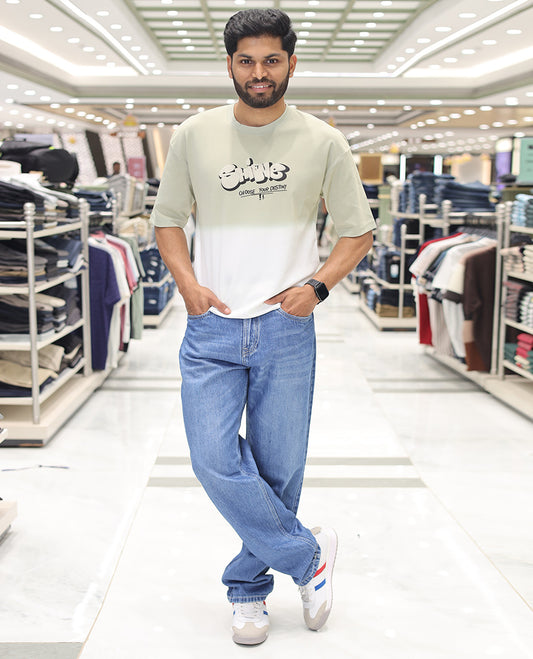 Green Cotton-Blended Ombre T-Shirt, Artfully Detailed with Funky Motifs and Typography Prints, Comes with a Crew Neck, Half-Sleeves, Oversized Fit, and Long Length