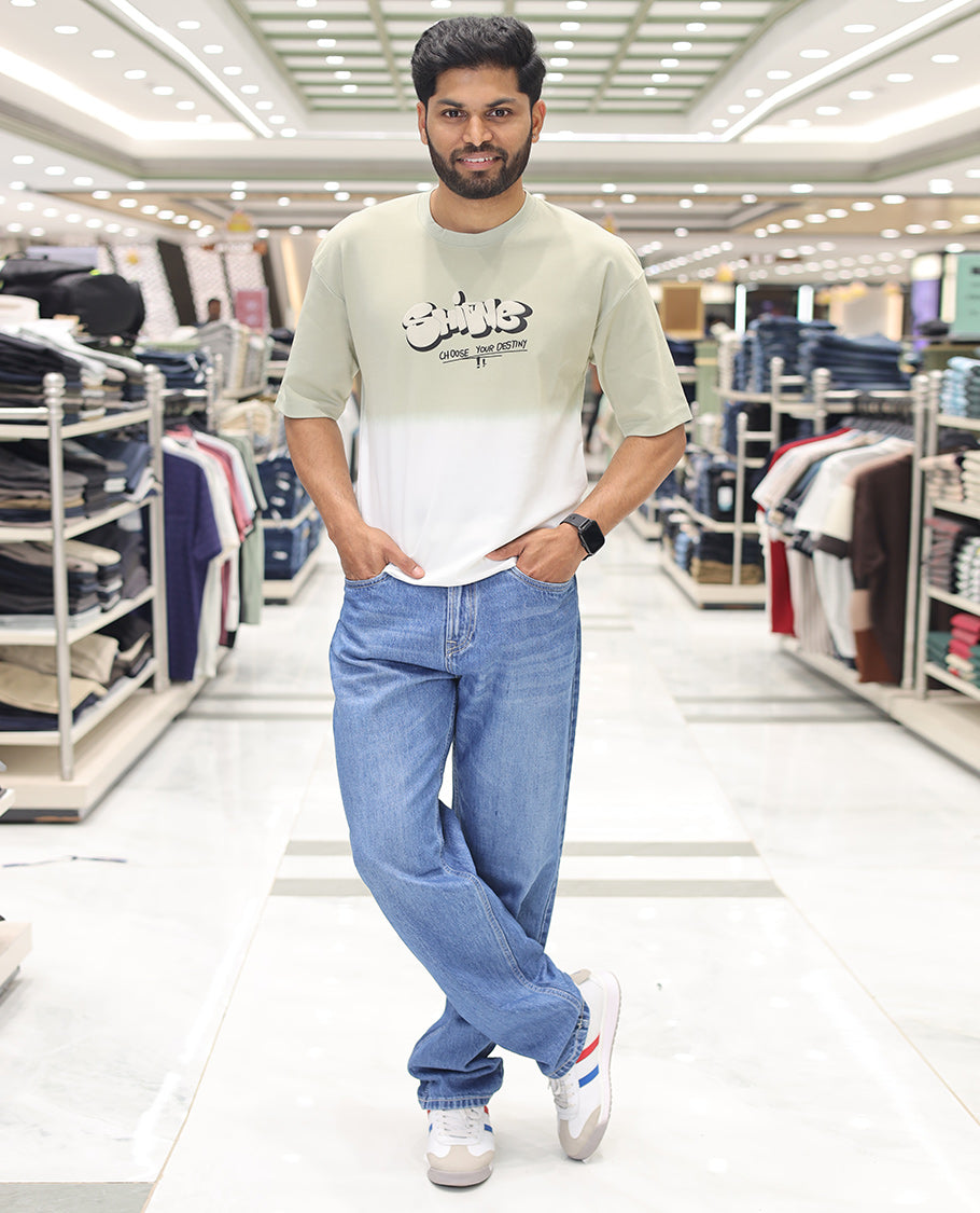 Green Cotton-Blended Ombre T-Shirt, Artfully Detailed with Funky Motifs and Typography Prints, Comes with a Crew Neck, Half-Sleeves, Oversized Fit, and Long Length