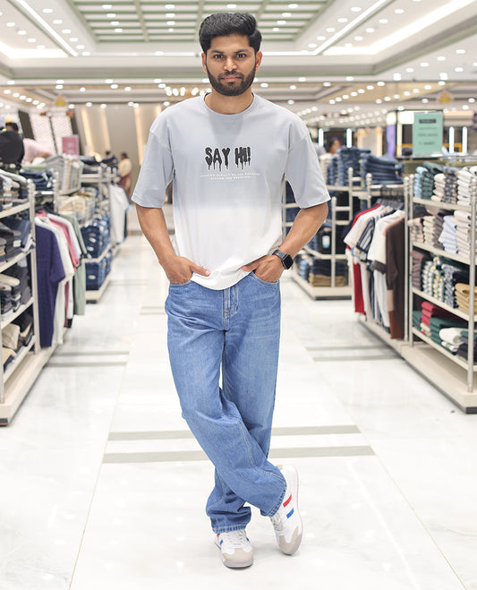 Grey Cotton-Blended Ombre T-Shirt, Artfully Detailed with Funky Motifs and Typography Prints, Comes with a Crew Neck, Half-Sleeves, Oversized Fit, and Long Length