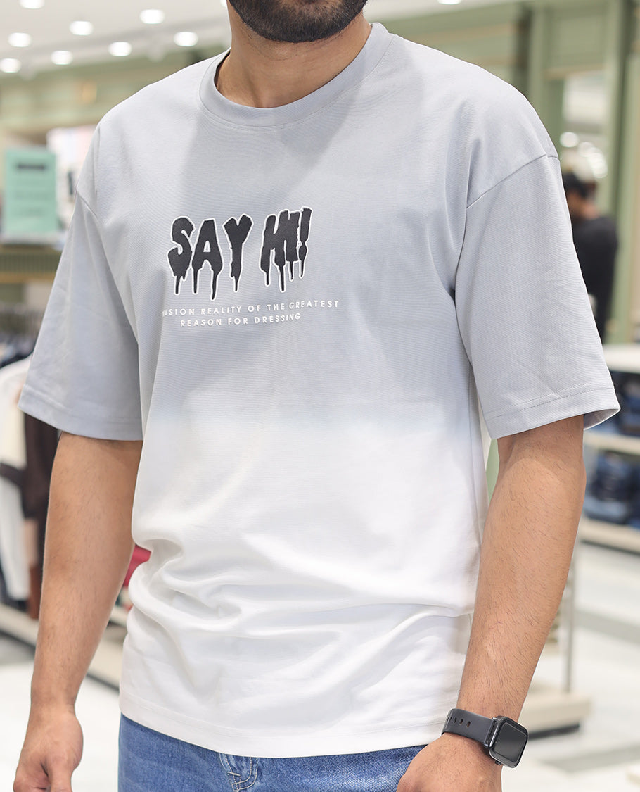 Grey Cotton-Blended Ombre T-Shirt, Artfully Detailed with Funky Motifs and Typography Prints, Comes with a Crew Neck, Half-Sleeves, Oversized Fit, and Long Length