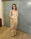 Rose Gold Samudrika Silk Saree, Majestically Detailed with Floral Jaal Jacquard Zari Weave, Grandly Woven Border Featuring Manga Mokku, Muthu, and Arumbu Manga Designs, the Pallu Steeped with Manga Designs, and Paired with Zari Design Blouse