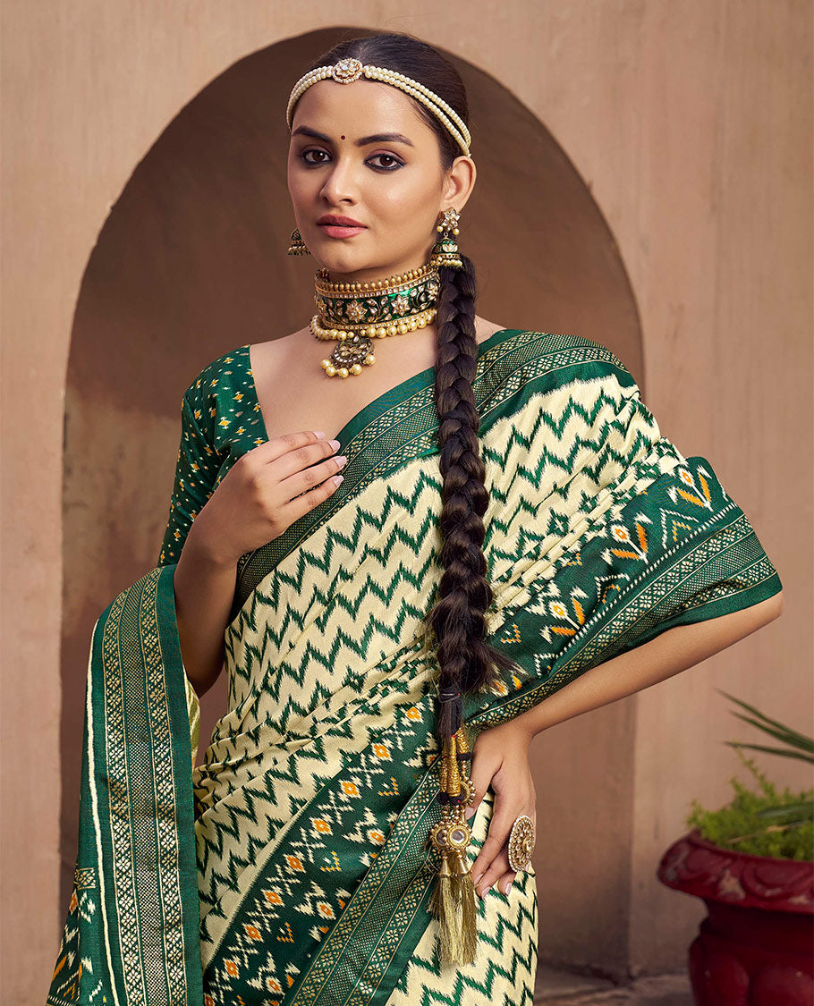 Pale Yellow Ikat Patola Designer Saree, Adorned with Ikat Chevron Stripes, Complemented by a Contrast Ikat Border, Ikat Woven Pallu, and a Contrast Blouse