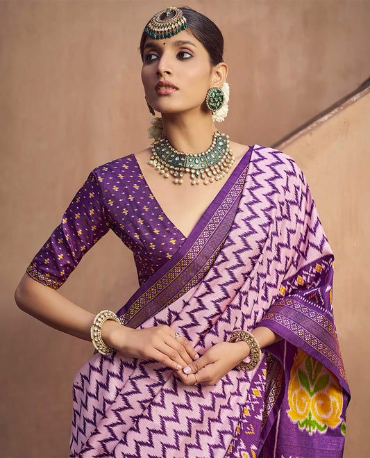 Pink Ikat Patola Designer Saree, Adorned with Ikat Chevron Stripes, Complemented by a Contrast Ikat Border, Ikat Woven Pallu, and a Contrast Blouse