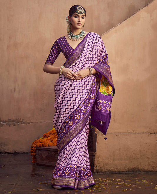 Pink Ikat Patola Designer Saree, Adorned with Ikat Chevron Stripes, Complemented by a Contrast Ikat Border, Ikat Woven Pallu, and a Contrast Blouse