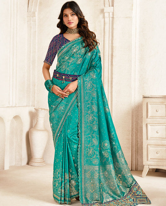 Green floral vine stone work designer saree, scallop stone work border, intricate pallu, and a embroidered belt
