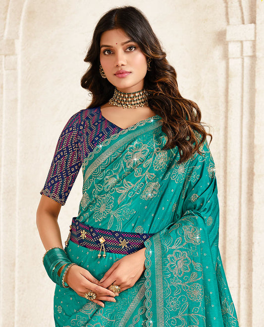 Green floral vine stone work designer saree, scallop stone work border, intricate pallu, and a embroidered belt