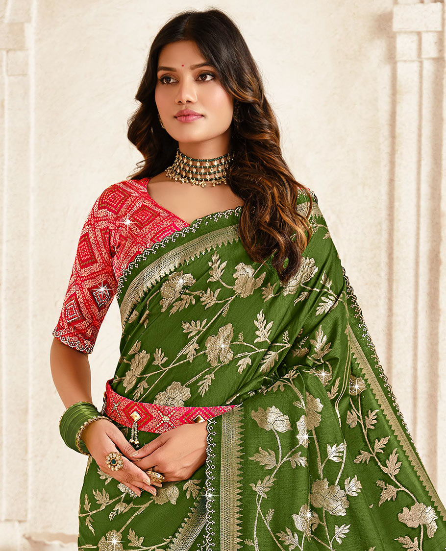 Green floral jaal designer saree, scallop stone work border, intricate pallu, and a embroidered belt