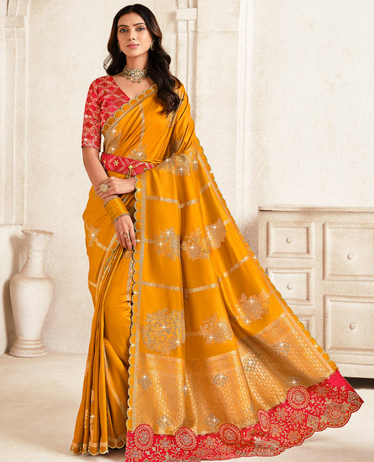 Orange stone work and zari weave designer saree, scallop stone work border, intricate pallu, and a embroidered belt