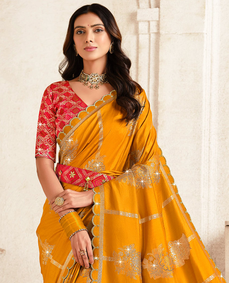 Orange stone work and zari weave designer saree, scallop stone work border, intricate pallu, and a embroidered belt