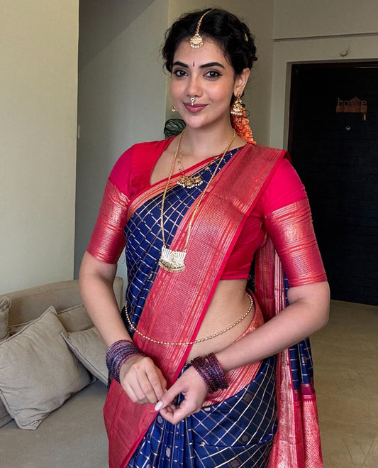 Blue zari checked with annam chakram buttas silk saree, contrast border of thilakam mokku, iruthalai pakshi, and ara maadam designs, and jaal pallu