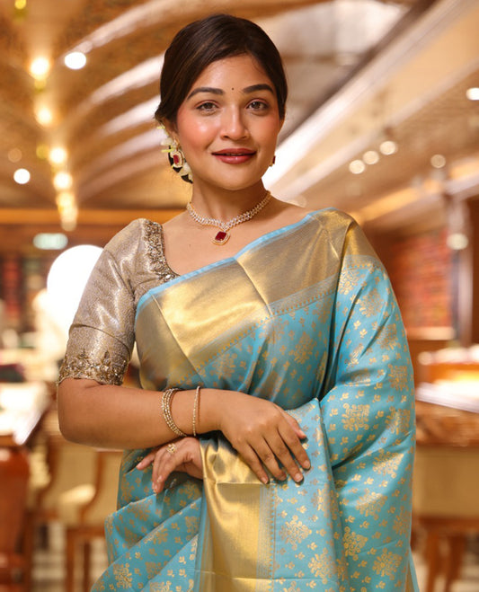 Sky Blue Budget Silk Saree, Enriched with Zari Buttas All Over Its Body, Highlighted by Traditional Zari Designs Woven Border, Grand Pallu, Paired with a Matching Blouse - Inspired by Trisha Blue Saree