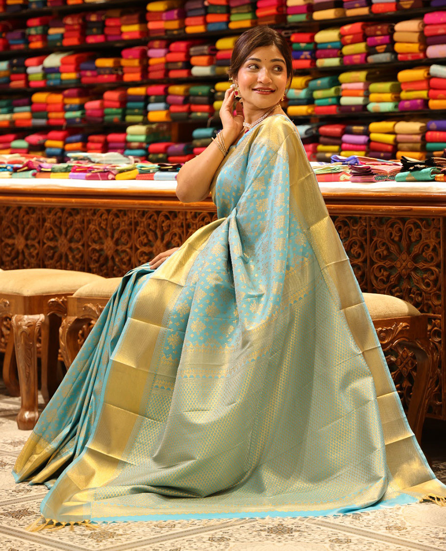 Sky Blue Budget Silk Saree, Enriched with Zari Buttas All Over Its Body, Highlighted by Traditional Zari Designs Woven Border, Grand Pallu, Paired with a Matching Blouse - Inspired by Trisha Blue Saree
