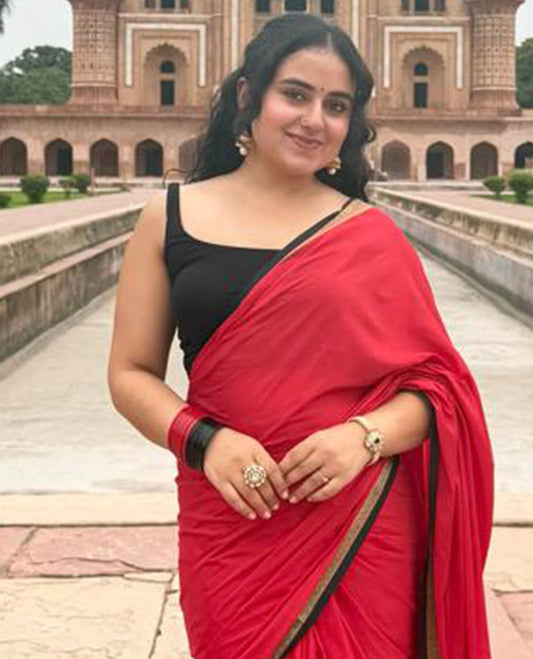 Red Plain Semi-Mysore Silk Saree, Complemented by a Contrast Traditional Zari Design Woven Border, Pallu Subtly Sparkled with Zari Stripes, and Paired with a Contrast Blouse