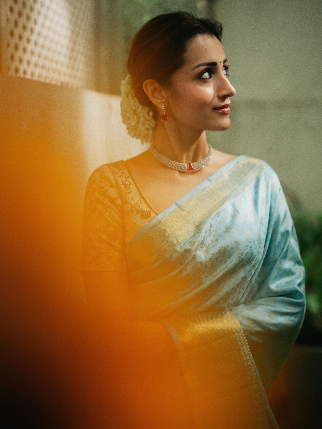 Blue Samudrika Silk Saree, Steeped in the Richness of Zari Buttas All Over Its Body, Highlighted by a Zari Border of Thilakam Mokku, Banaras, Muthu, Lathir, and Mayil Kann Designs, Gleaming Grand Pallu, and Paired with a Matching Blouse