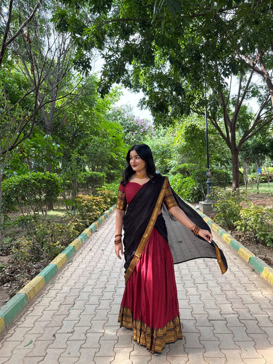 Red-Black Chettinad Cotton Saree Features a Plain Skirt, a Contrast Traditional Zari Border, Matching Blouse, and Contrast Syska Georgette Dhavani